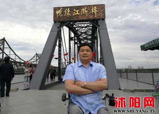 輪椅上的“愛心使者”