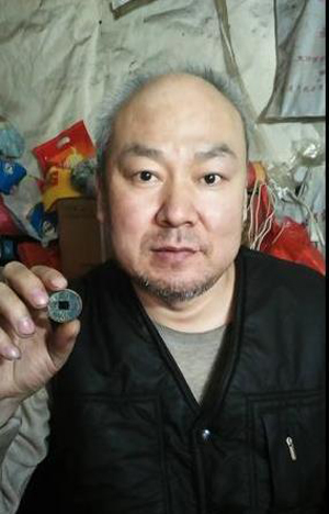 薛建華:一位殘疾人的錢幣收藏夢(mèng)